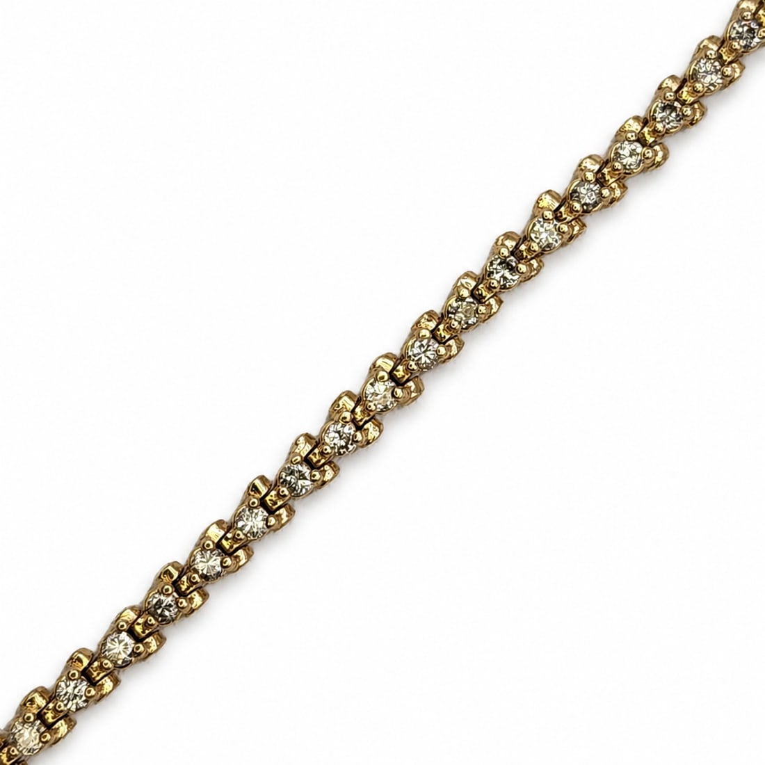 Yellow gold diamond bracelet: A 14kt gold bracelet. Diamond 1.50 cts H-I Color VS-SI clarity. 7 1/2 inches long 7.45 grams