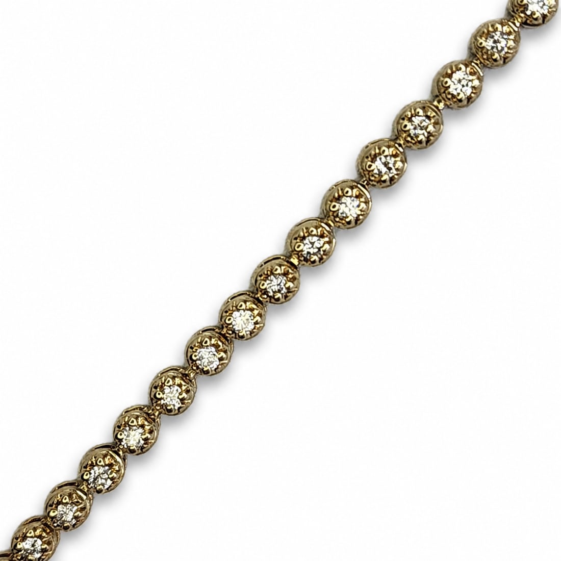 Yellow gold diamond bracelet: A 14kt gold bracelet. Diamond 1.50 cts G-H Color VS-SI clarity. 7 inches long 8.2 grams