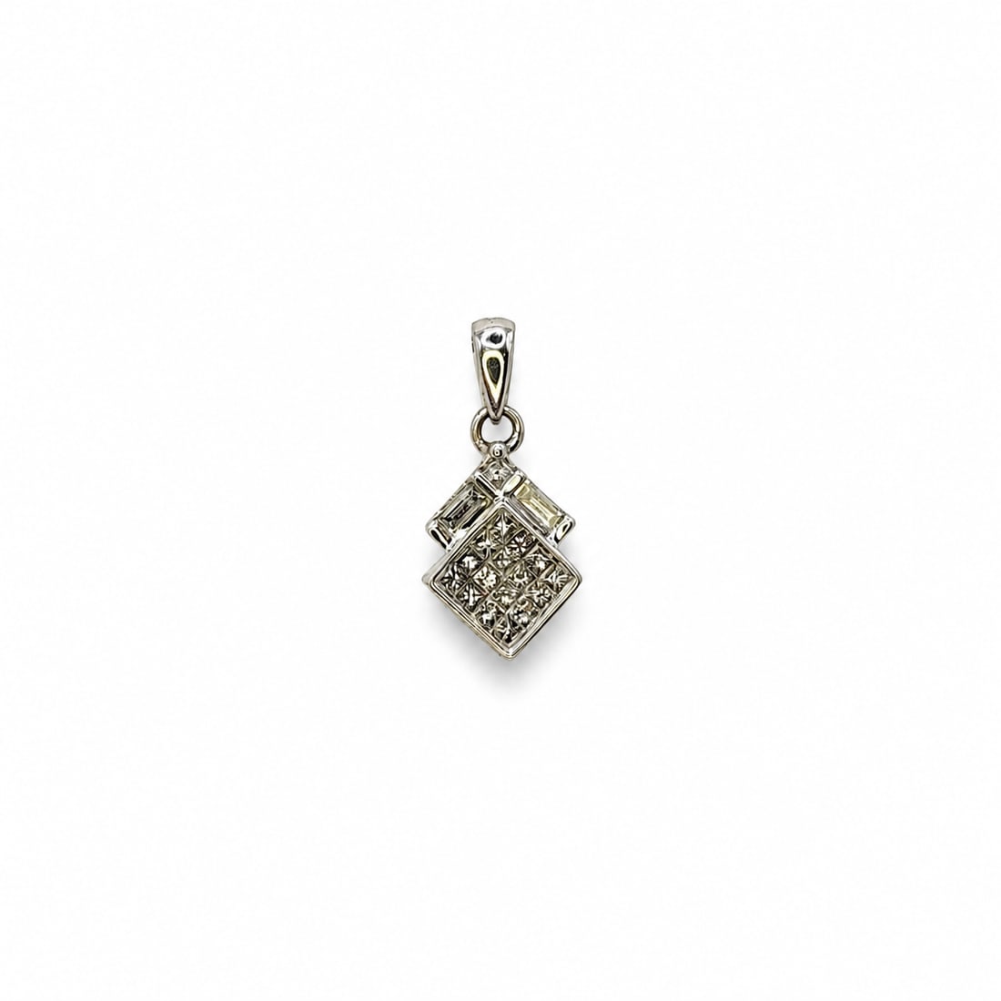 White gold diamond pendant: A 14kt White gold pendant. Diamonds .60 H-I color VS clarity. .74x.37 inches 1.75 grams