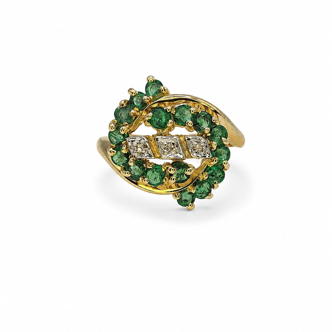 Yellow gold diamond emerald ring: A 14kt yellow gold ring. Diamonds. Emeralds 1.6cts. Size 7 3/4. 5.43 grams