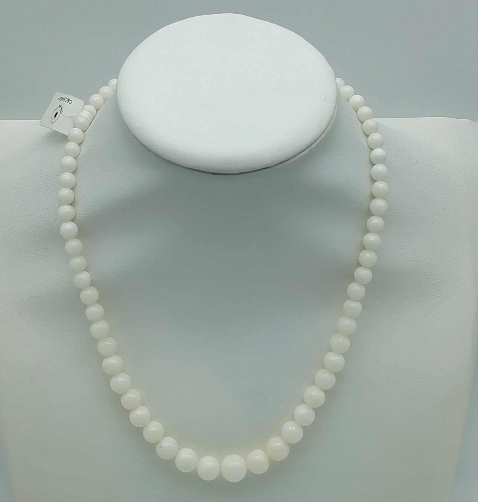Graduated White Misu Coral and Cubic Zirconia 925 Sterling Silver Clasp Necklace: Graduated white Misu coral and cubic zicornia 925 sterling silver clasp necklace / Material: Natural white Misu coral beads (Japanese/Deep-Sea precious coral), expertly graduated in size / Dimensions:
