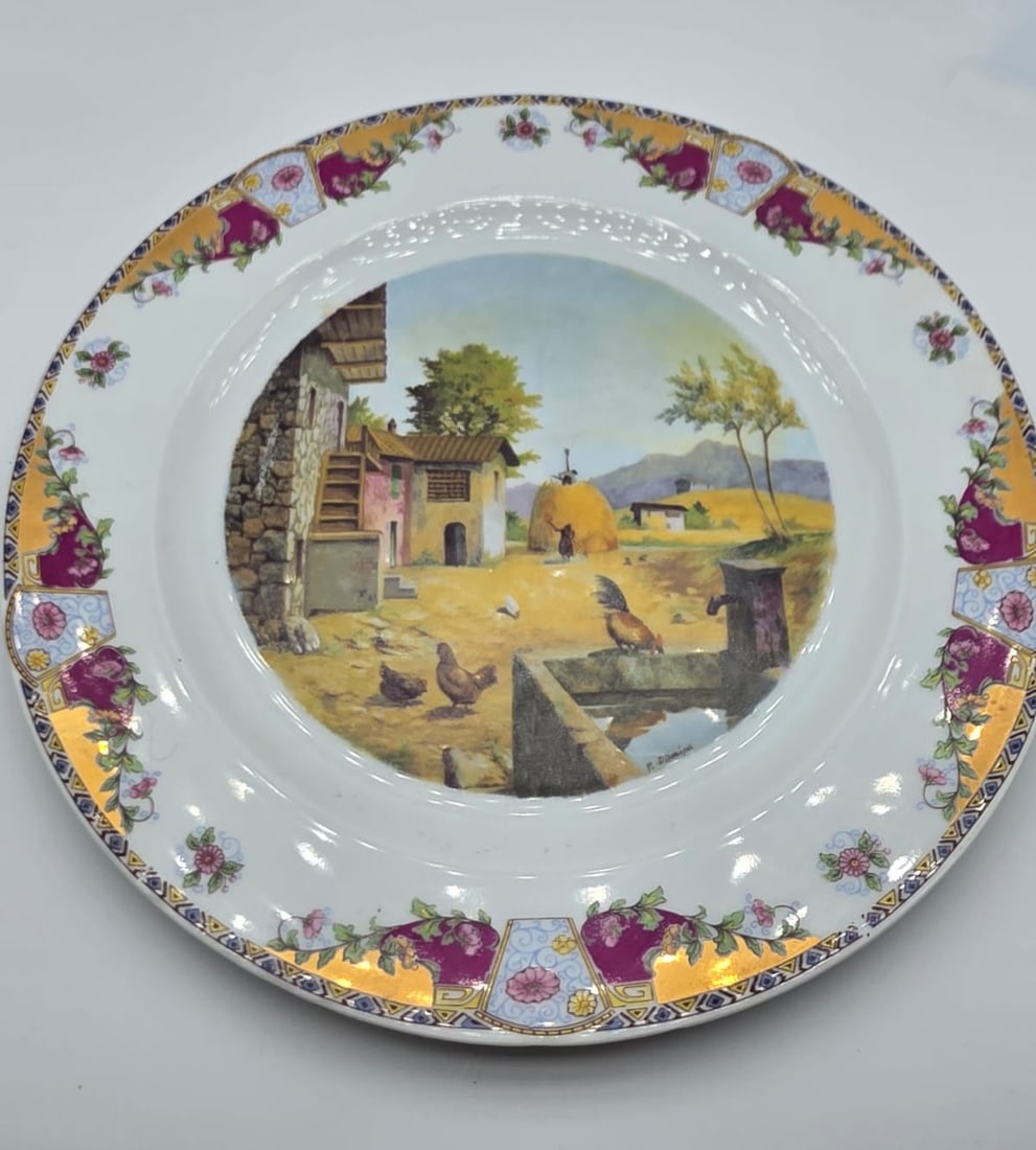 Set of 2 Limoges Hand-Painted Porcelain Wall Plates with Rural Landscape Scenes / French Decorative: Pair of decorative wall plates crafted from fine French porcelain by Limoges, featuring hand-painted pastoral scenes with rural Italian farmhouses, poultry, and rolling landscapes after original artwo