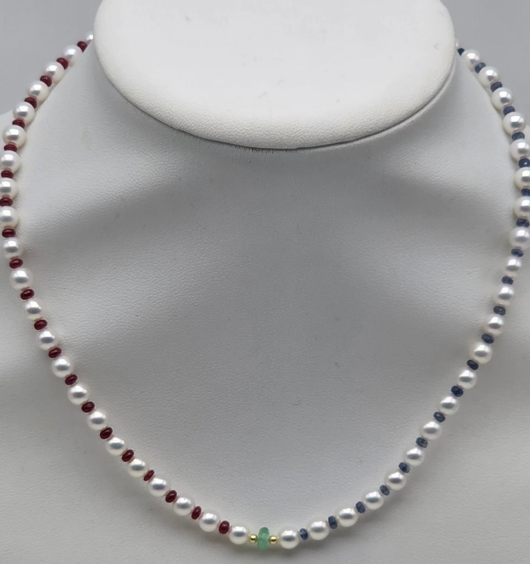 Fine Akoya Pearl Necklace with Natural Rubies, Sapphires, Emerald and 18K Gold Clasp: Fine jewelry gemstone necklace / Metal: Solid 18K Yellow Gold (750) / Total Item Weight: 16.0 Grams / Length: 41.5 cm / Pearl Type: Cultured Akoya / Pearl Size: 5.3 to 5.4 mm / Pearl Color: White / Pe