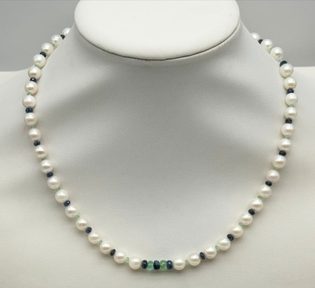Akoya Pearl Necklace with Sapphire and Emeralds (6.5–7 mm) and Solid 18K Gold Clasp: Fine jewelry pearl and gemstone necklace / Metal: Solid 18K Gold (750) Clasp / Total Item Weight: 24.95 Grams / Pearl Type: Cultured Akoya Pearls / Pearl Size: 6.5 to 7.0 mm / Length: 43.5 cm / Gemsto