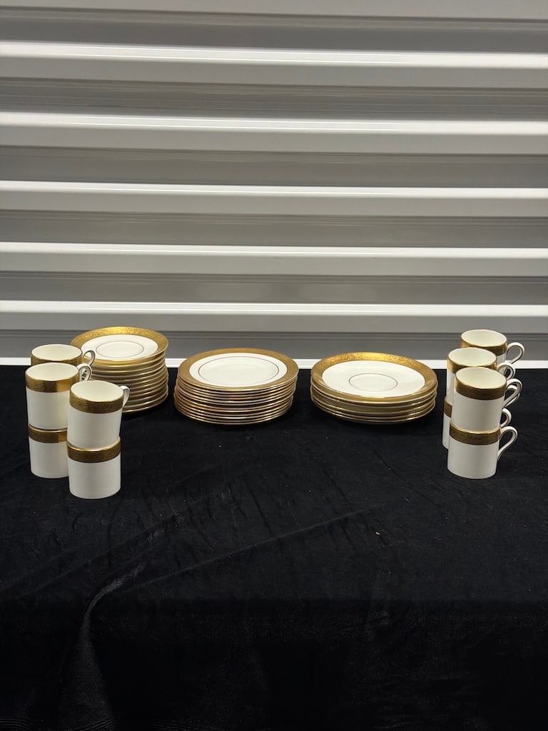 42-Pc Wedgwood Ascot Gold-Encrusted Bone China Dinner & Coffee Service: Approximately 42-piece Wedgwood Ascot bone china service featuring classic white porcelain richly decorated with wide gold-encrusted borders and fine black accent lines. Made in England, the collectio