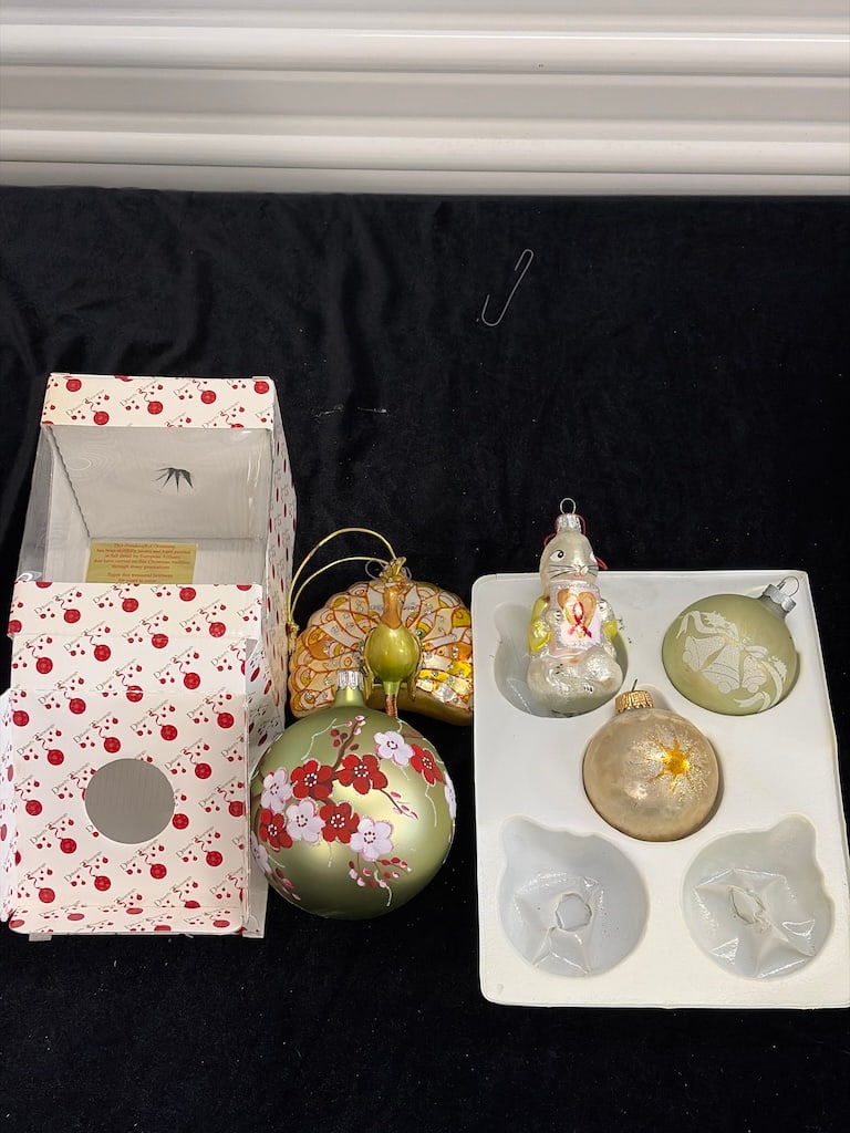 Vintage Christmas Ornaments Set with Decorative Box: "Vintage Christmas Ornaments Set with Decorative BoxThis set includes a green ornament with floral designs, a peacock ornament, and four additional assorted ornaments."
