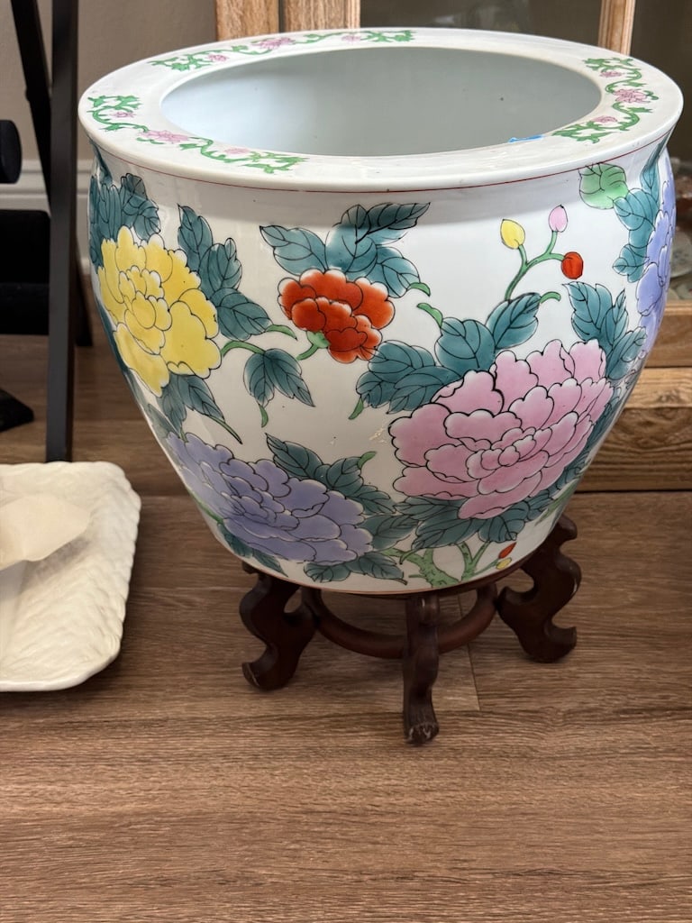 Vintage Hand-Painted Chinese Planter: Large Chinese Famille Rose Style Porcelain Jardinière PlanterLarge Asian porcelain jardinière featuring colorful peony and floral decoration in pink, yellow, orange, green, and blue, with a