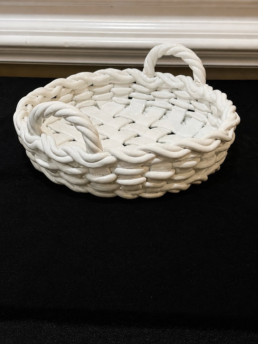 Large White Glazed Ceramic Woven Basket Centerpiece with Handles: "Large White Glazed Ceramic Woven Basket Centerpiece with HandlesLarge white glazed ceramic centerpiece designed in the form of a woven basket, featuring an open lattice body, dimensional braided trim