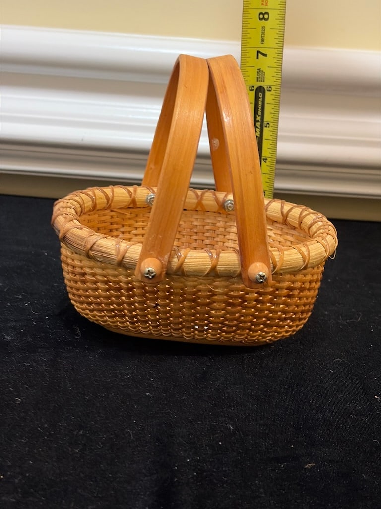 Vintage Nantucket-Style Miniature Woven Basket with Wooden Handles: "Vintage Nantucket-Style Miniature Woven Basket with Wooden HandlesVintage Nantucket-style miniature basket featuring tightly woven natural cane construction, reinforced wrapped rim, and double wooden