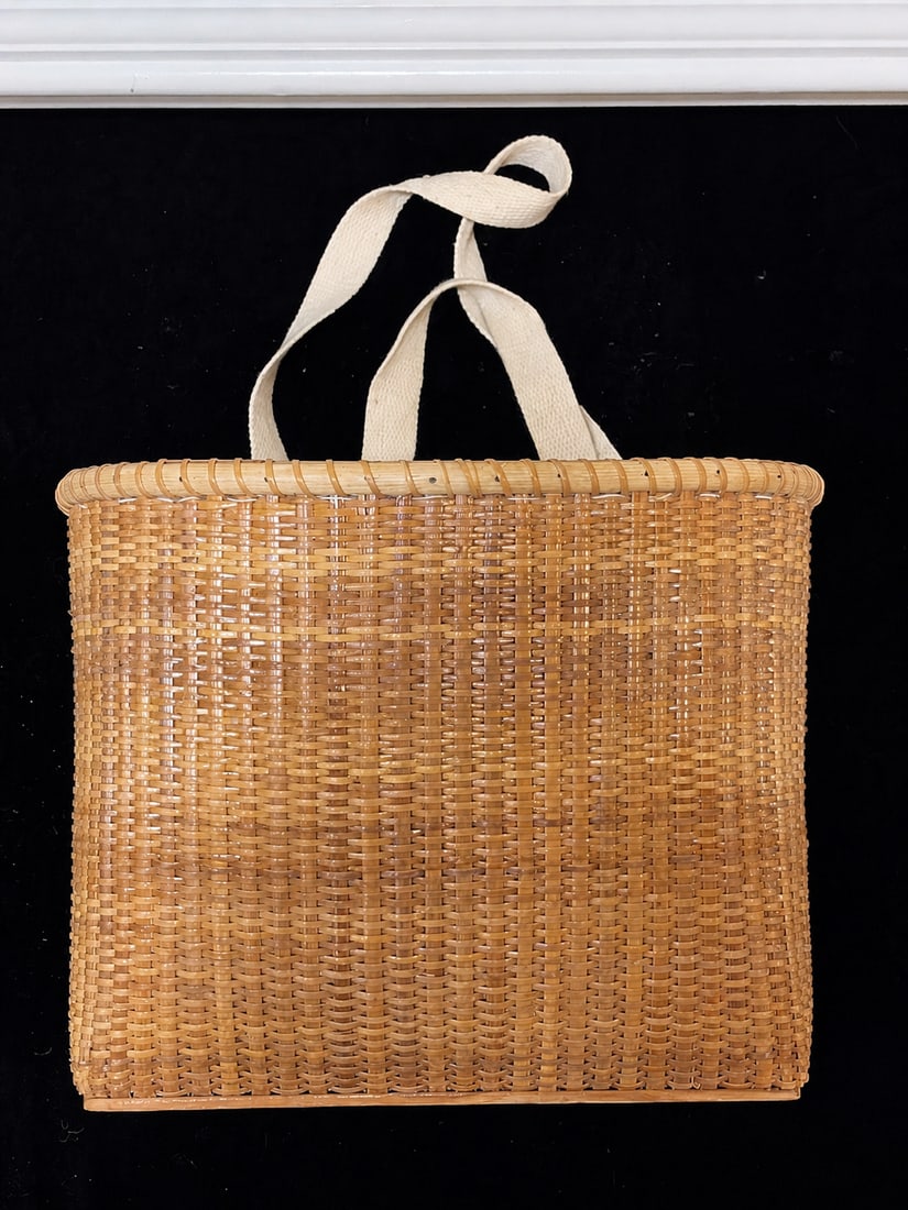 Vintage Nantucket-Style Woven Rectangular Tote Basket: "Vintage Nantucket-Style Woven Rectangular Tote BasketFinely woven rectangular Nantucket-style basket featuring tightly woven natural cane construction, a reinforced rim and base, and fabric carrying 