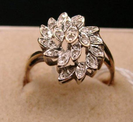 10K Yellow & White Gold Diamond Cocktail Ring. 20: 10K Yellow & White Gold Diamond Cocktail Ring. 20 Diamonds, Size 7, 2.4 Grams.