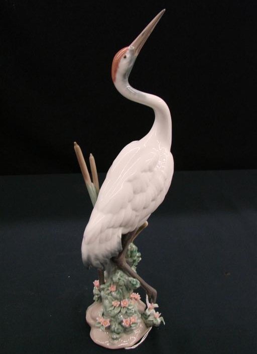 Lladro Figurine "Dancing Crane" #0010-1614 Mint in: Lladro Figurine "Dancing Crane" #0010-1614 Mint in Original Box. Depicts Crane with Head Held High. By Sculptor Salvador Debon. Issued 1989, Retired 2000. The Crane Figures are Very Difficult to Find.