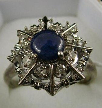 Art Deco 14K White Gold Diamond & Sapphire Ring: Art Deco 14K White Gold Diamond & Blue Cabochon Sapphire Princess Ring, Size 9. 6 Grams. Auction Estimate $300-500.