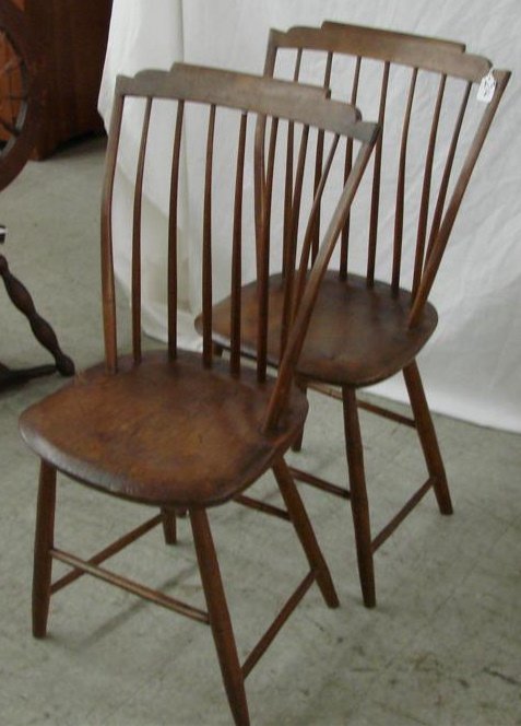 2 Early 19th Centruy Windsor Rod-back Side Chairs: Pair of Early 19th Century Windsor Rod-back Side Chairs with Hickory Slats & Supports on Ash Saddle Seats & Cross Stretcher Supports. (Circa 1810-1820) 35" Ht. Auction Estimate $300-500.