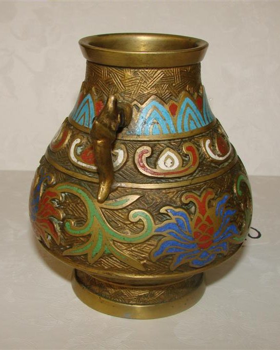 Signed Japanese Champleve Vase, 4.75" Ht, with Ser: Signed Japanese Champleve Vase, 4.75" Ht, with Serpent Head Handles. Auction Estimate $50-100.