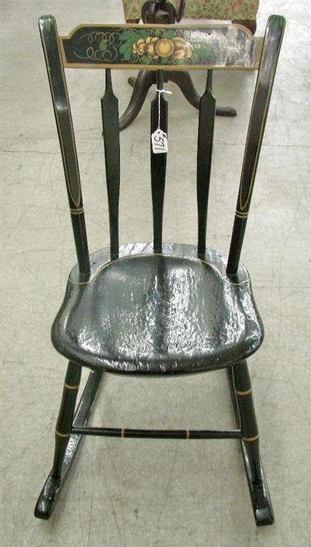 Early Hitchcock-Style Arrow Back Rocking Chair wit: Early Hitchcock-Style Arrow Back Rocking Chair with Stenciled Decoration. Circa 1860's. Auction Estimate: $100-200.