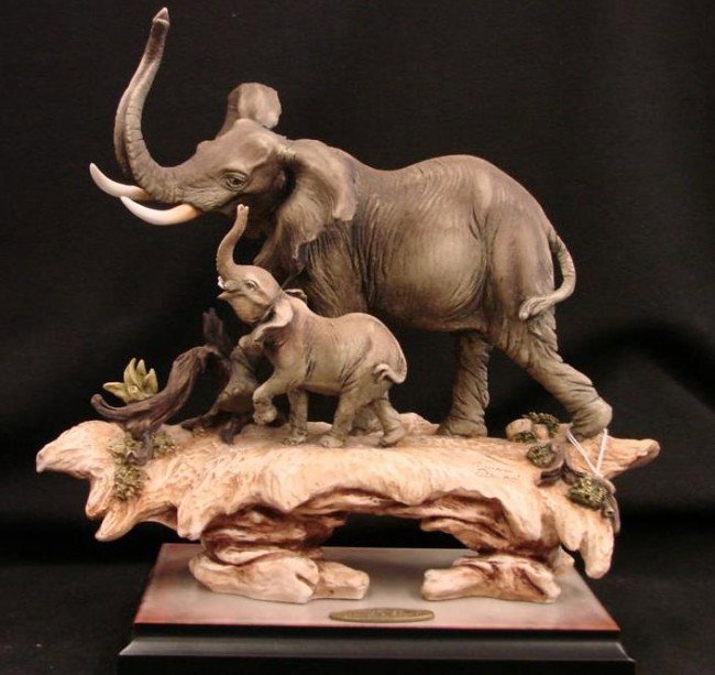 Ltd. Ed. Giuseppe Armani Elephant Statue, "A Mothe: Ltd. Ed. Giuseppe Armani Elephant Statue, "A Mothers Touch", # 329/3000. Depicts Mother & Baby Elephant on Rock & Wood with Flowers. 13" W x 12" H. Auction Estimate: $200-400.