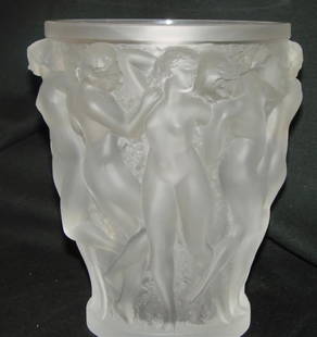 Lalique Crystal "Bacchantes" Vase. Lalique's most: Lalique Crystal "Bacchantes" Vase. Lalique's most iconic piece featuring 12 young priestesses celebrating the wine harvest in time-honored tradition. Originally designed in 1927 From the Ltd. Ed. Homm