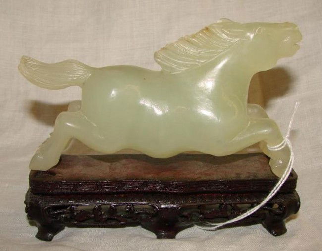 Carved Jade Horse on Teak Wood Stand. Auction Esti: Carved Jade Horse on Teak Wood Stand. Auction Estimate: $200-400.