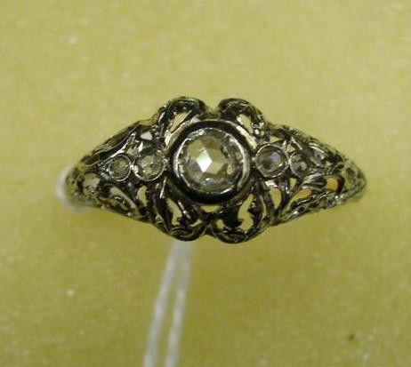 Antique Art Deco 14K Filigree Diamond Ring. 14K Ye: Antique Art Deco 14K Filigree Diamond Ring. 14K Yellow and White Gold Setting. Size 8.5; 2.4 grams. Auction Estimate: $200-400.