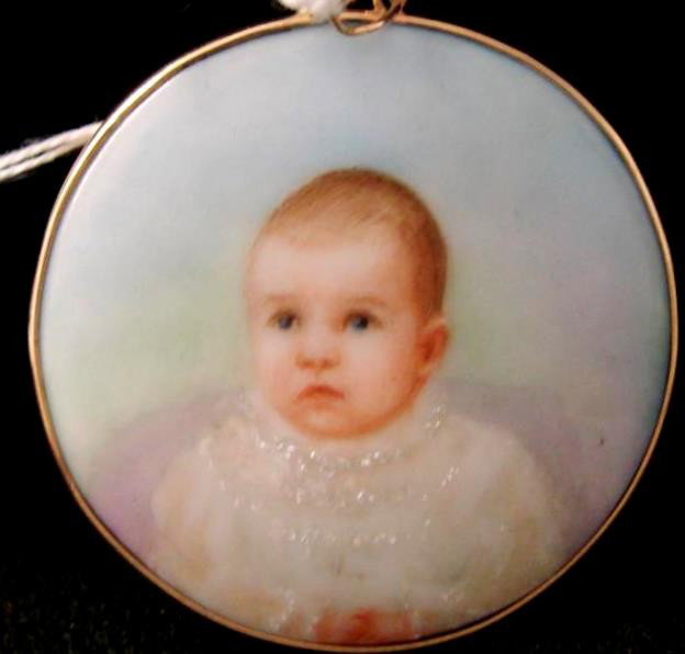 10K Painting on Porcelain of 4 mo Old Baby. Artist: 10K Painting on Porcelain of 4 mo Old Baby. Artist Initial on Reverse. Mourning Jewelry, Framed in 10K Yellow Gold with a Ring at Top to Wear as a Pendant. 2" Diameter. Auction Estimate: $100-200.