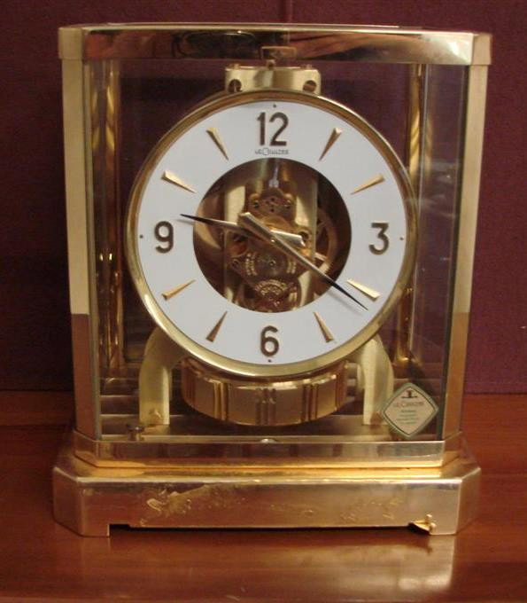 Vintage LeCoultre Atmos Perpetual Motion Clock: Vintage LeCoultre Atmos Perpetual Motion Clock. In Working Condition. (Note: Glue Remains where Name Plate was Removed.) Auction Estimate: $600-800.
