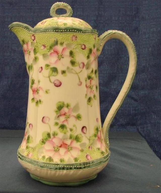 Antique Hand Painted Unsigned Nippon Cocoa Pot: Antique Hand Painted Unsigned Nippon Chocolate Pot, with Flower and Moriage Decorations. Auction Estimate: $50-100.