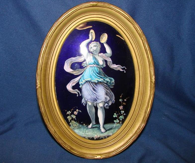 Antique Enamel on Copper Plaque w/Semi Nude Lady : Antique Enamel on Copper Plaque w/ Semi Nude Lady Dancing in a Field of Flowers and Holding Tambourines above her Head, Outstanding Detail. Oval Frame is 8" x 6". Auction Estimate: $200-400.