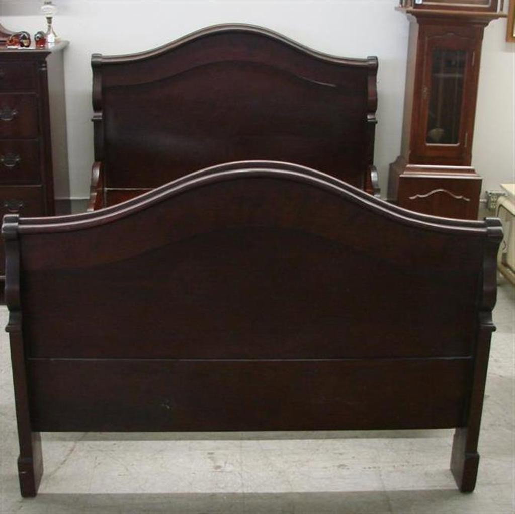 19th c. Mahogany Full Size Bed w/ Carved Headboard: 19th c. Mahogany Full Size Bed with Shaped & Carved Headboard, Footboard & Rails. Auction Estimate $200-400.