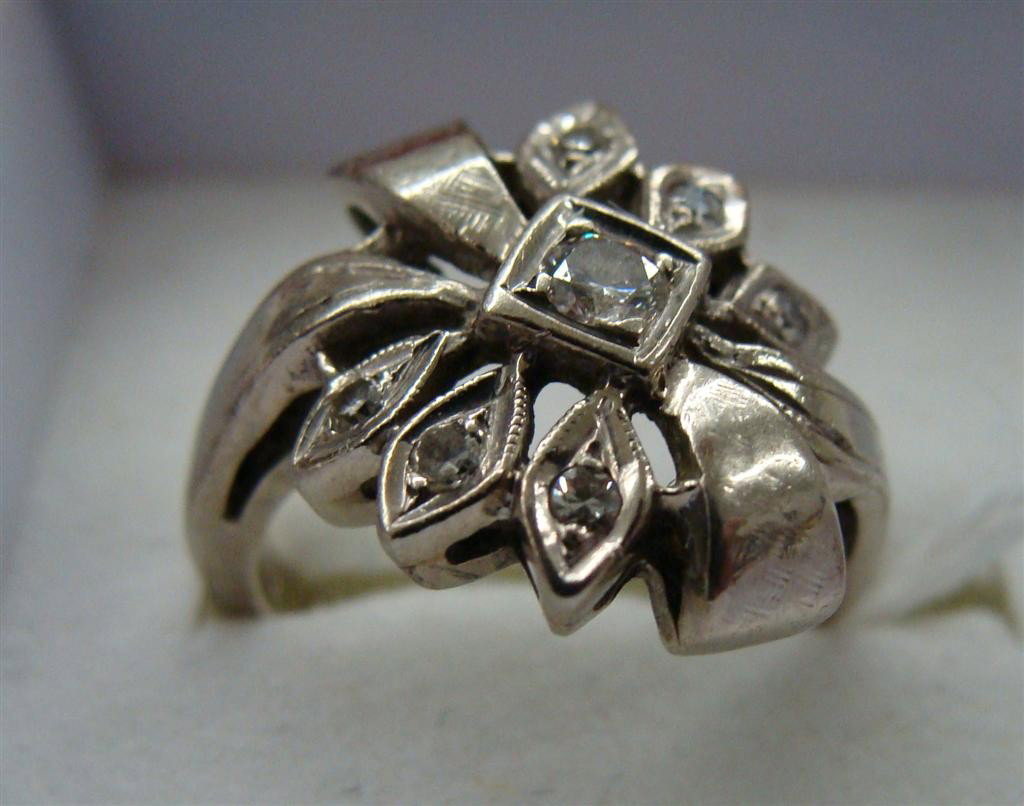 Antique 14K White Gold Diamond Art Deco Ring : Antique 14K White Gold Diamond Art Deco Ring in Flower & Bow Form. Size 3; 3.7 Grams. Auction Estimate $200- 300.