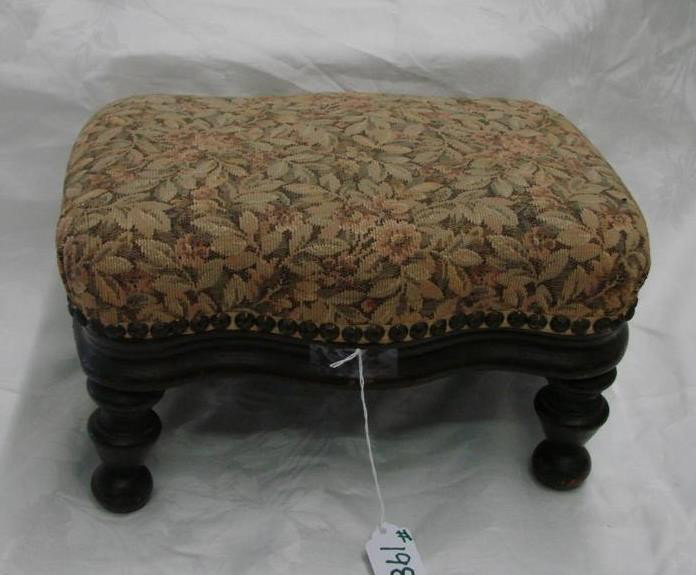 19th c. Walnut Footstool with Floral Upholstery: 19th c. Walnut Footstool with Floral Upholstery on Ring Turned Legs. 14 x 10". Auction Estimate $50-100.