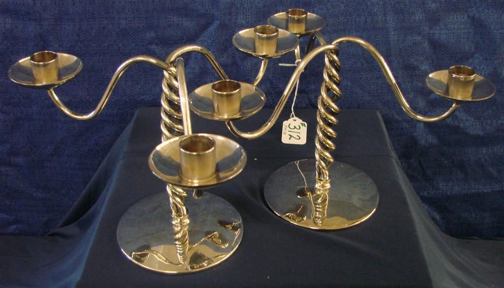 Pr Signed Art Moderne Silver 3-Sconce Candelabrum: Pair of Signed Art Moderne Silver 3-Sconce Candelabrum. 7.5" h. Auction Estimate $50-100.