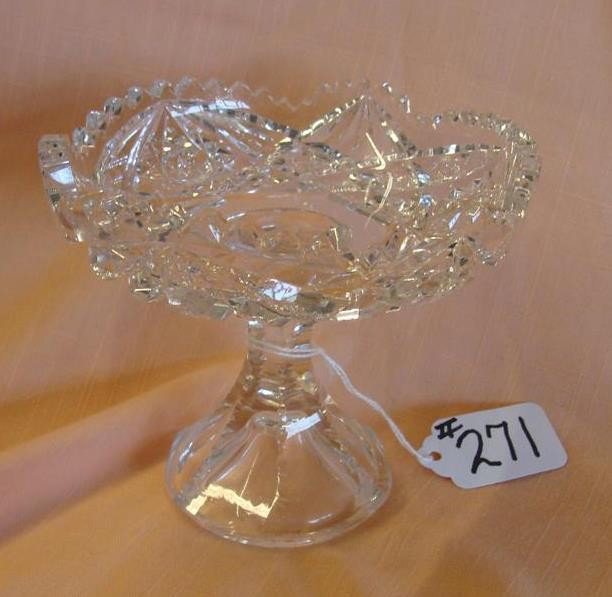 American Brilliant Period Cut Glass Compote;: American Brilliant Period Cut Glass Compote; 5" Dia x 4.5" Ht. Pinwheel & Cross Hatching Design. Note: Flakes to Top. Auction Estimate: $40-60.