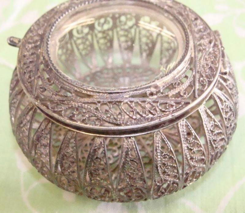 Sterling Silver & Bowed Glass Ring Holder: Sterling Silver Pierced Ring Holder with Bowed Glass Insert in Lid. Exquisite Design. 1.34 Troy Oz. Auction Estimate $100-200.