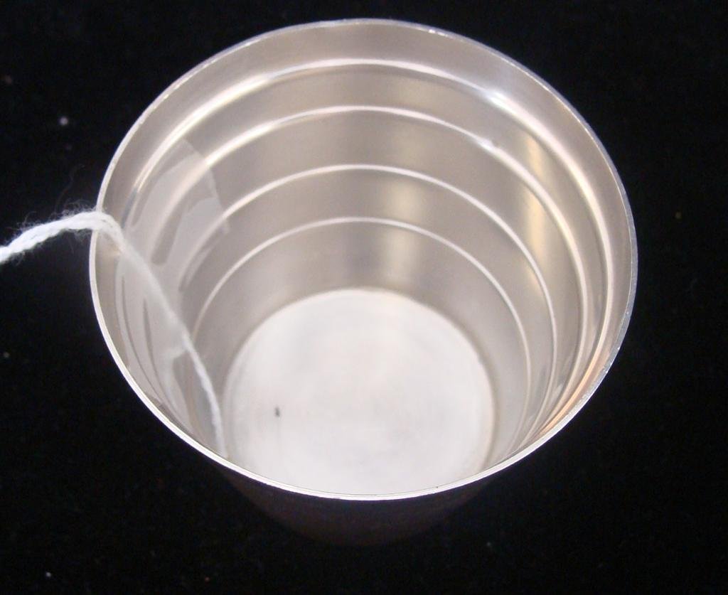 Mid Century Tiffany & Co Sterling Silver 2 oz Jigg: Vintage Signed Tiffany & Co Sterling Silver 2 oz Jigger / Shot Glass with Ribbed Design; Circa 1950s. 2 1/8" Diameter x 1 7/8" Ht. 30 Grams. Neat vintage Tiffany & Co 2 ounce sterling shot glass. It's