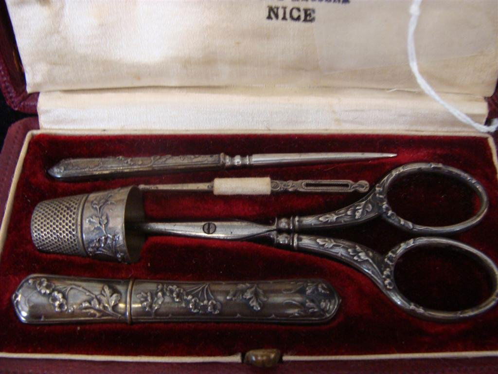 Antique 19th Century 800 Silver Travel Sewing Kit: 19th Century French Silver Five Piece Travel Sewing Kit: Includes Stitch Remover, Needle, Scissors, Needle Case & a Thimble in its original Velvet-Lined Case. Some pieces are Hallmarked Illegibly. We