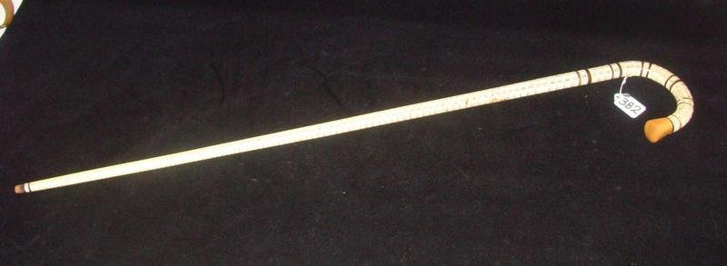 19c Ship Art: Captain's Marine Vertebrae Cane: 19th Century Captain's Shark Vertebrae Cane or Walking Stick with a Curved Handle; Ship Art. 35" Length. Auction Estimate $200-400