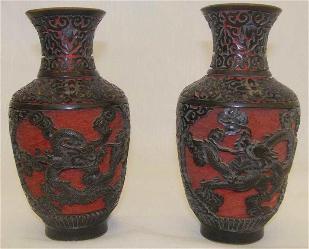 Pair of 19c Chinese Dragon & Floral Cinnebar Vases: Pair of 19th Century Chinese Cinnabar Vases with Carved Dragons & Florals; 6.75" Ht. Auction Estimate $100-200.
