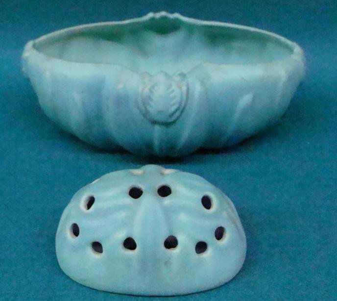 2pcs Van Briggle Art Pottery: Includes an Oval Shaped B: 2pcs Van Briggle Art Pottery: Includes an Oval Shaped Bowl 8.5" along with a Flower Frog. Auction Estimate: $50-100.