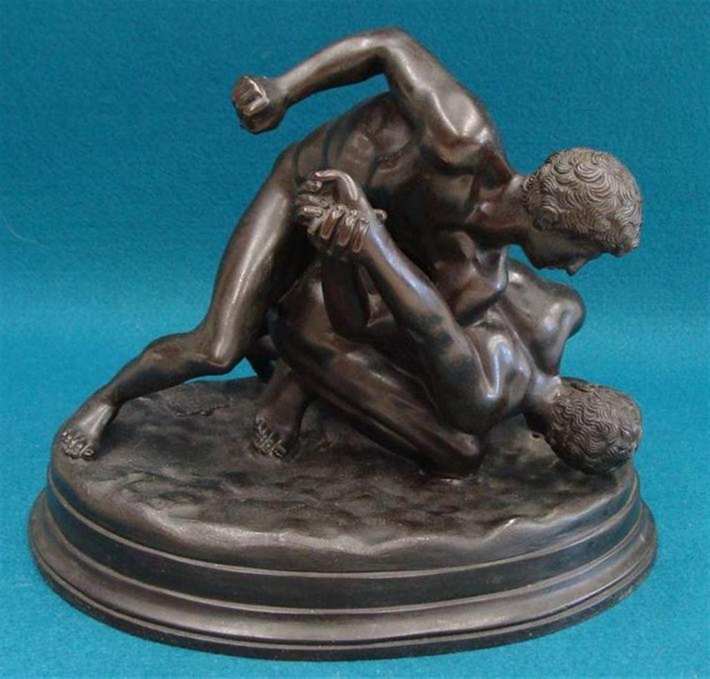 Solid Cast Bronze From the Chiurazzi Foundry: Two Roman: Solid Cast Bronze From the Chiurazzi Foundry: Two Roman Greco Wrestlers. 8" Ht on a 10 1/8" x 7 1/8" Oval Base Embossed Made in Italy & Chiurazzi Naples Foundry Mark. Auction Estimate: $300-400.
