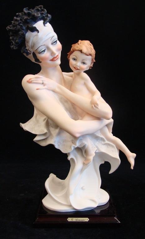 Giuseppe Armani Figurine: Tenderly #526P. Artist Signed: Giuseppe Armani Figurine: Tenderly #526P. Artist Signed Giuseppe Armani. Depicts Bust of Young Mother Holding Nude Toddler. 13.5" Ht. Box & COA. Auction Estimate: $300-500.