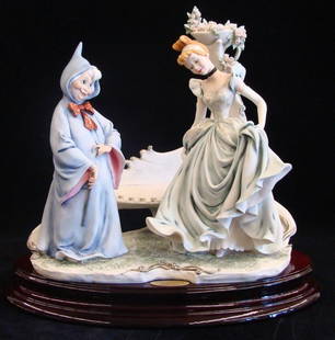 Giuseppe Armani Figurine: Cinderella & Fairy Godmother: Giuseppe Armani Figurine: Cinderella & Fairy Godmother #1421C. Ltd Ed #569/750. Artist Signed Giuseppe Armani. Depicts Cinderella & Fairy Godmother in Garden after The Magic! 13.25" ht. Box & COA. Auc