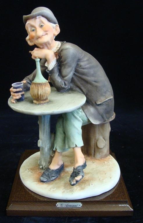 Giuseppe Armani Figurine: Drunk Richard #3243C. Older E: Giuseppe Armani Figurine: Drunk Richard #3243C. Older Edition. Depicts an Old Man Seated at Table Drinking. Auction Estimate: $250-350.