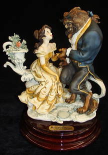 Giuseppe Armani Figurine: Beauty & The Beast #543C. Ltd: Giuseppe Armani Figurine: Beauty & The Beast #543C. Ltd Ed #44/2000. Artist Signed Giuseppe Armani. Depicts the Beast & Belle Sitting on a Bench Exchanging a Tender Glance. Box & COA. Auction Estimate