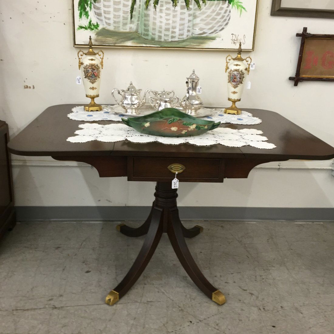 Antique Mahogany Duncan Phyfe Breakfast Table.: Antique Mahogany Duncan Phyfe Breakfast Table with Drawer on Each Side; Splayed Legs & original Brass Cap Feet. Auction Estimate: $200-300.