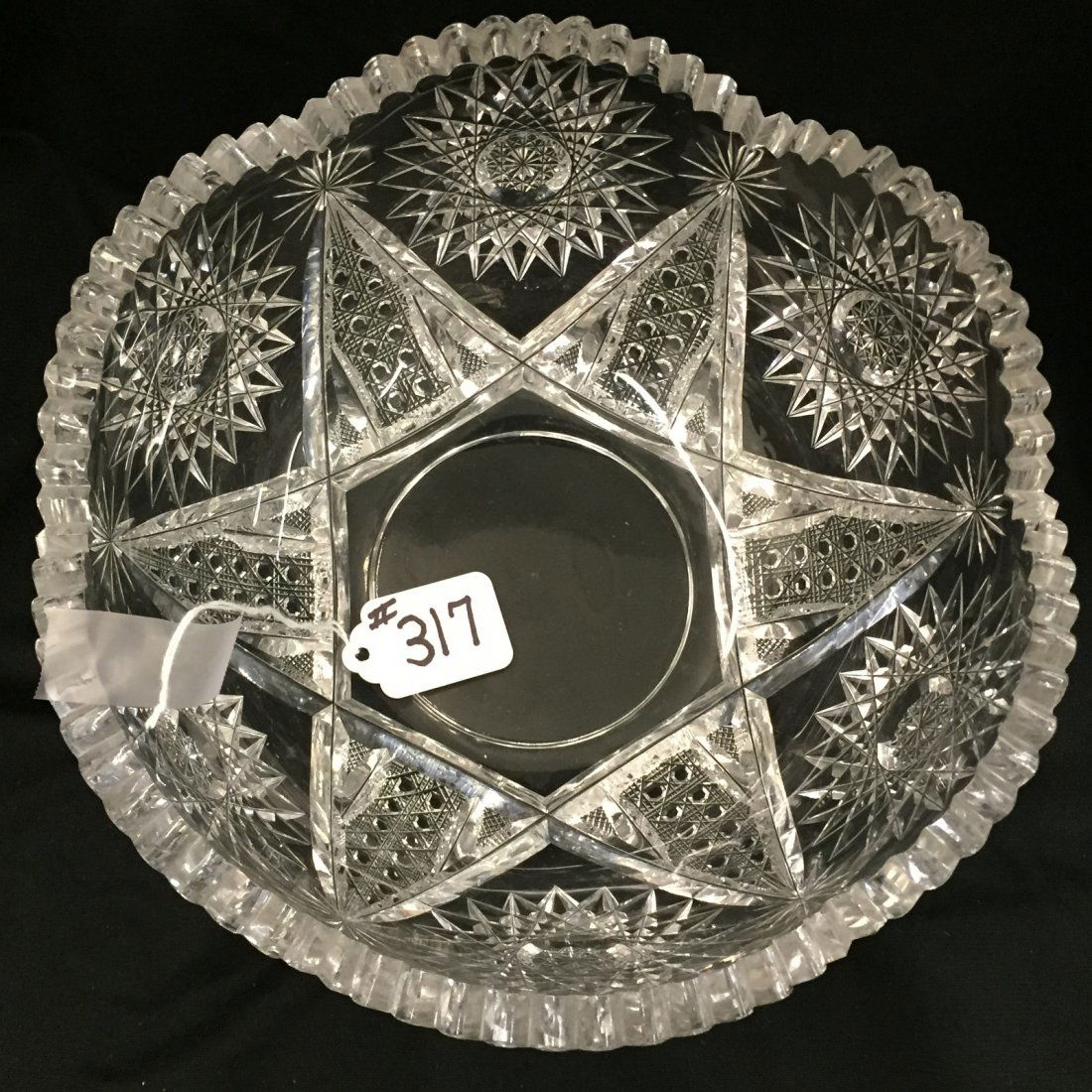 American Brilliant Period Cut Glass Heavy Bowl.: American Brilliant Period Cut Glass Heavy Bowl (Deep Cuts) 9" Dia with Pinwheel, Daisy & Button & Star Cuts. Note: Chip on One Tooth. Auction Estimate: $100-200.