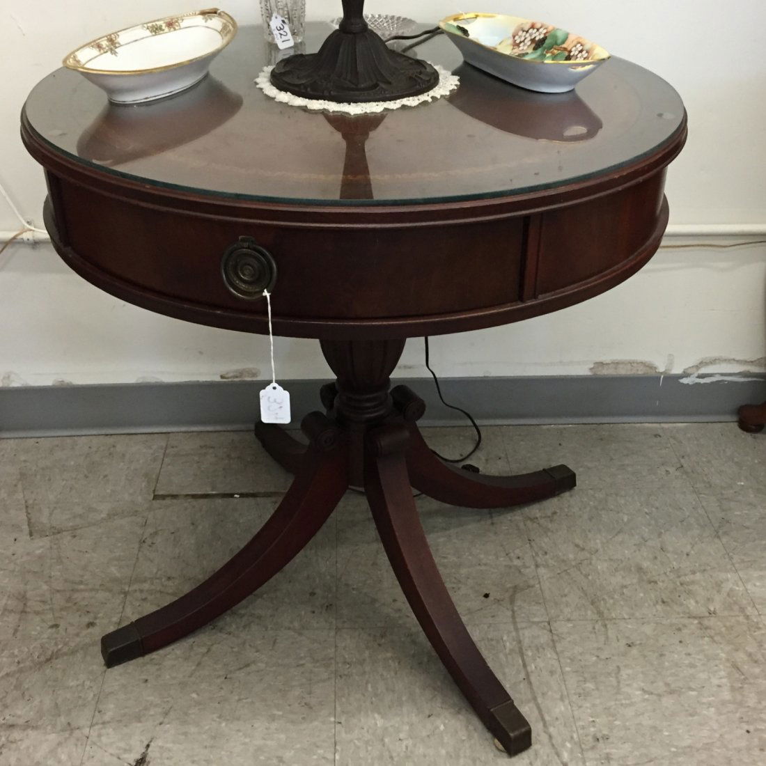 Leather Top Drum Table; Mahogany with Single Drawer.: Leather Top Drum Table; Mahogany with Single Drawer on Urn Form Support with Duncan Phyfe Style Splayed Legs. Auction Estimate: $100- 200.