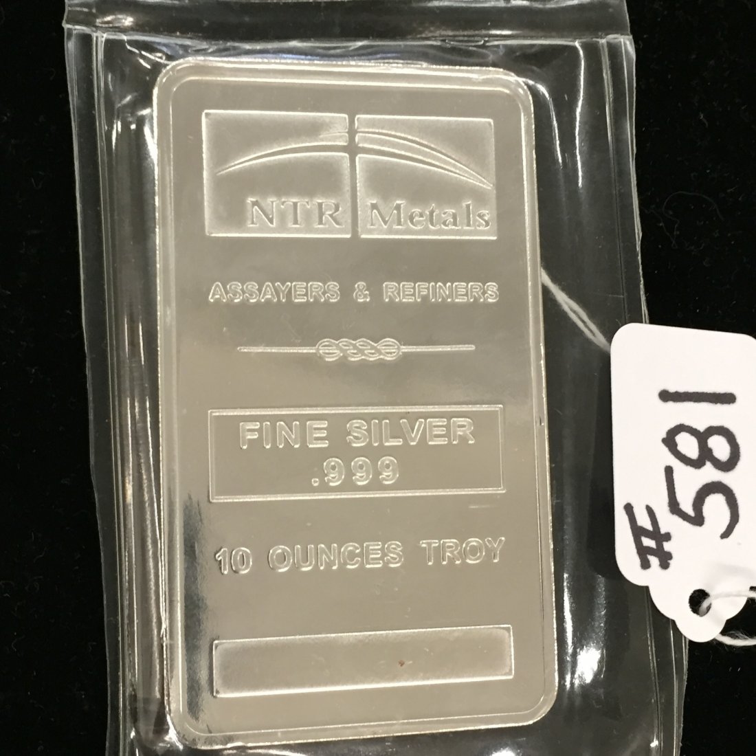 NTR Metals Assayers & Refiners 10 Oz .999 Fine Silver: NTR Metals Assayers & Refiners 10 Oz .999 Fine Silver Bar. Auction Estimate: $300-500.