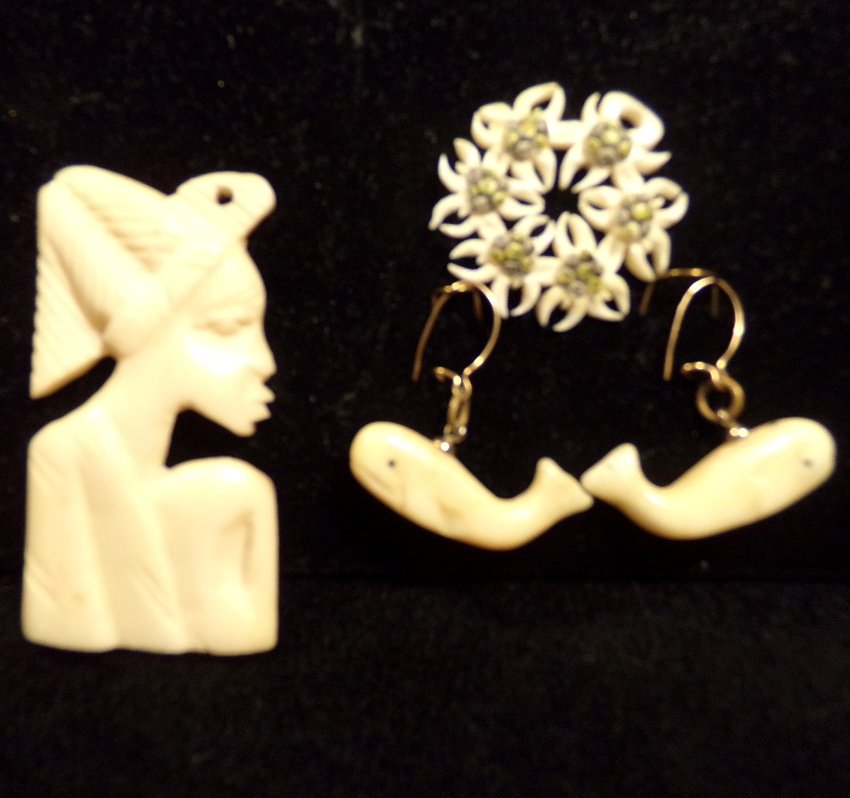 3pc Antique Ivory Jewelry: 3pc Antique Ivory Jewelry. Figural African woman pendant flower pendant, and a pair of whale shaped earrings for pierced ears). Pre-ban.
