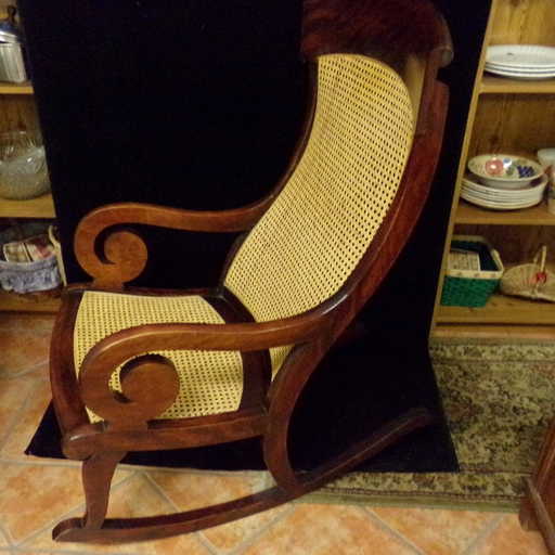 Antique Lincoln Rocking Chair Cane Seat & Back Antique Lincoln Rocking Chair Cane Seat & Back. See Sold Price - Antique Lincoln Rocking Chair Cane Seat & Back